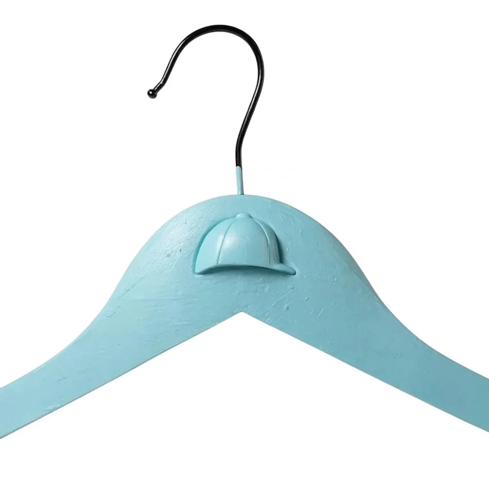Teal Hanger with Angled Shoulders for the Equestrian attire adorned with helmet.